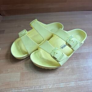 Birkenstock Arizona EVA sandals in a bright yellow size 3